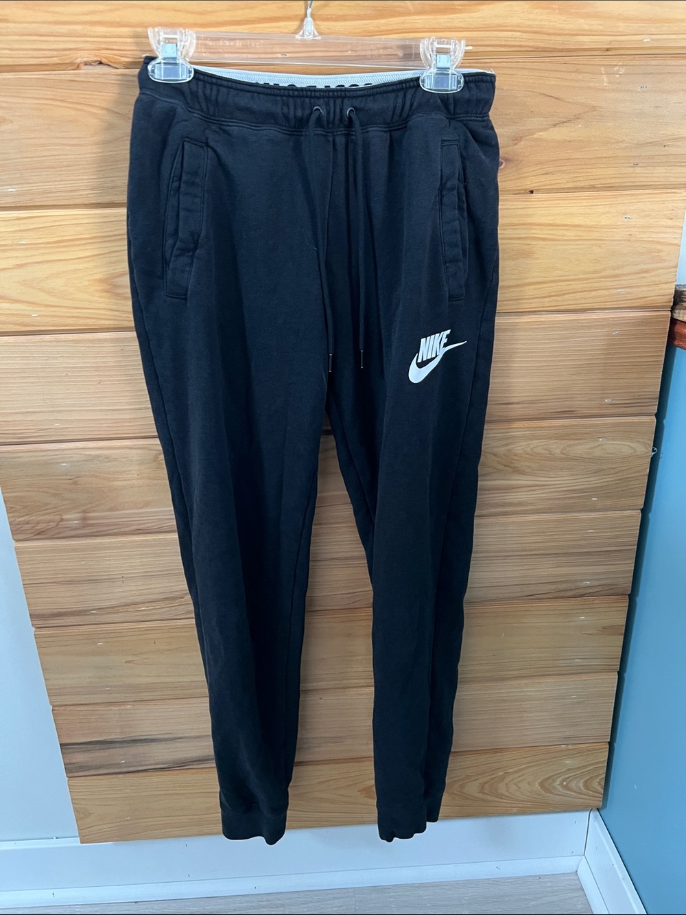 Nike Black Jogger Pants with White Nike Swoosh Logo